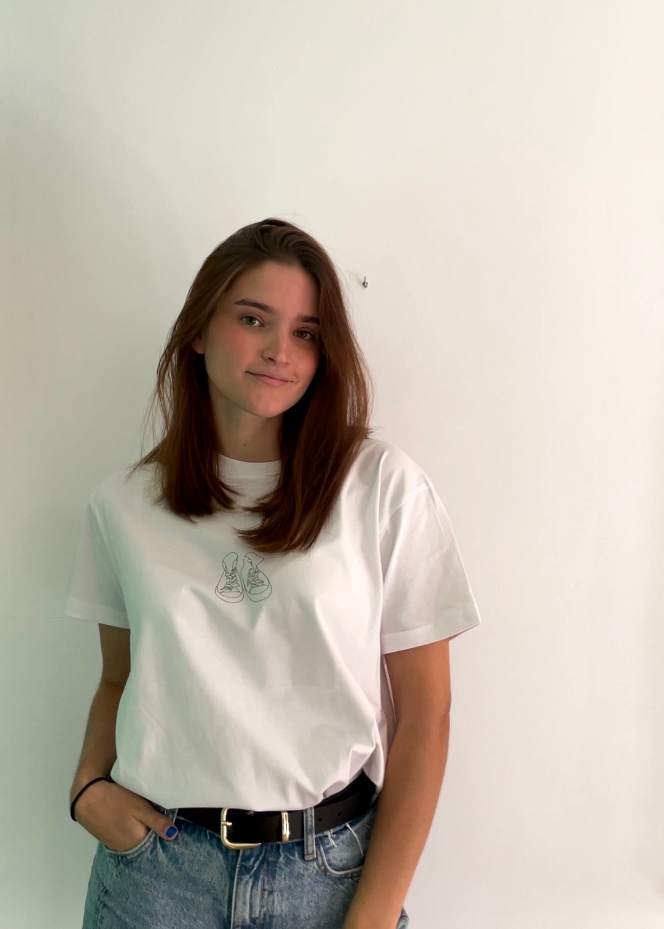 Camiseta “zapatillas”